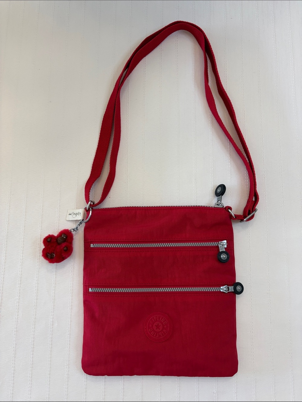 Kipling Red Crossbody with Playful Pom Charm